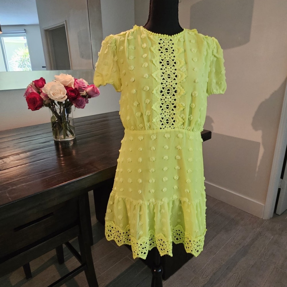 Lace dress with peek-a-boo accent.